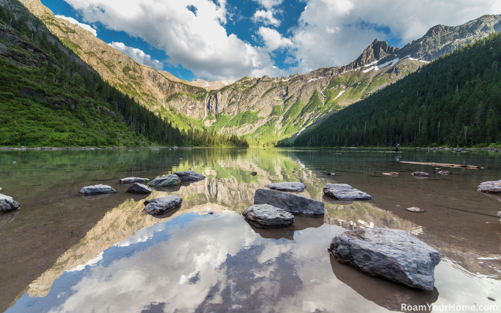 The hike climbs gently until you reach Avalanche Lake.  Once you get there, you are treated to tremendous views. Avalanche Lake sits at the base of the 8,689-foot Bearhat Mountain; amongst the soaring peaks behind Avalanche Lake, there are several waterfalls tumbling hundreds of feet. This trail is appropriate for most children but may be too much for young kids. If you only have time to do one hike in Glacier, we definitely recommend you consider Avalanche Lake! Pictures don't do their beauty justice.